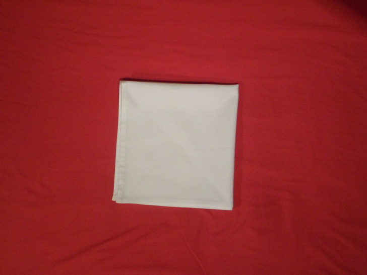 Folding napkins for silverware Step Four fold the napkin in half once more making it one quarter of its original size. 