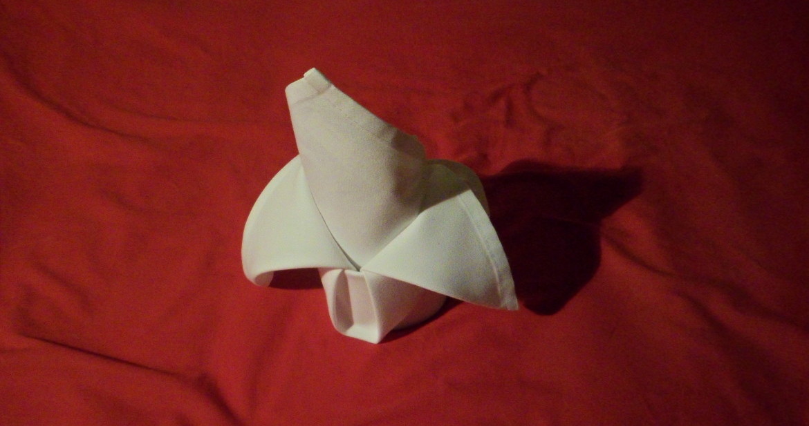 Very difficult napkin fold to achieve. the crown fold is extremely hard to get symmetrical