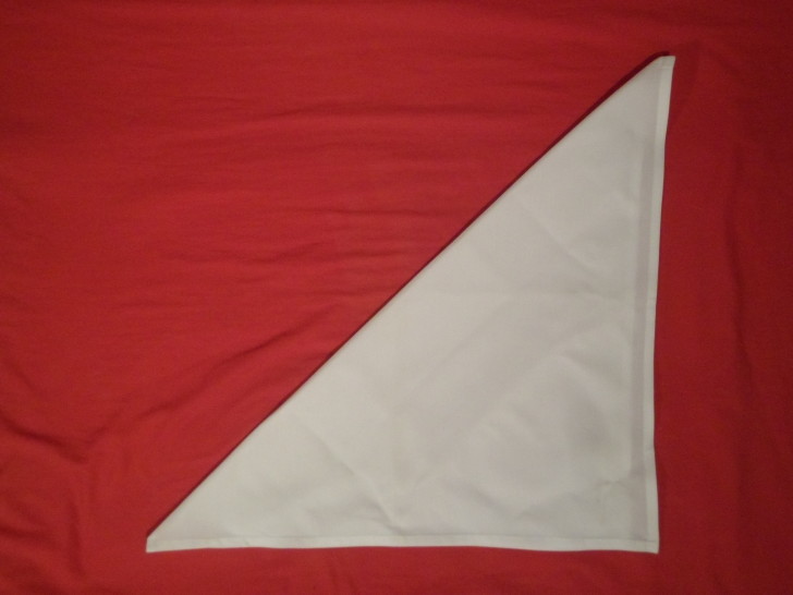 How To Fold Napkins The Crown Fold Step Two fold the napkin diagonally 