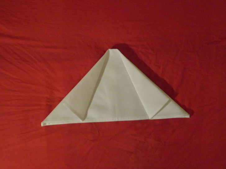 How to fold napkins arrowhead. Step six repeat the previous step with the opposite side of the napkin folding the left side back out on its self. 