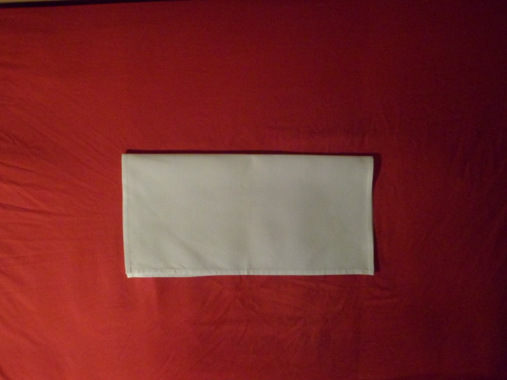 Folding Cloth Napkins Slide Napkin Fold Step Fold the napkin in half towards yourself 