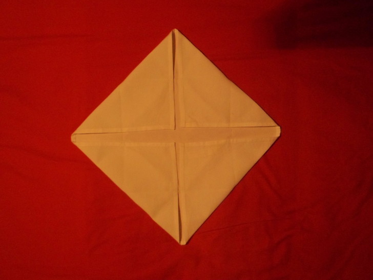 Napkin Folding Rose Fold Step Five fold the top left down closing the envelope 