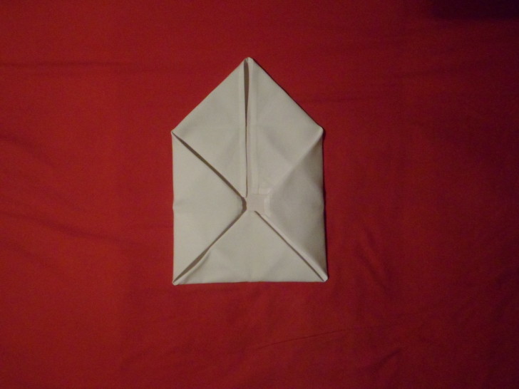 Napkin Folding Rose Fold Step Eight Fold the right corner in so you have a envolope once more.