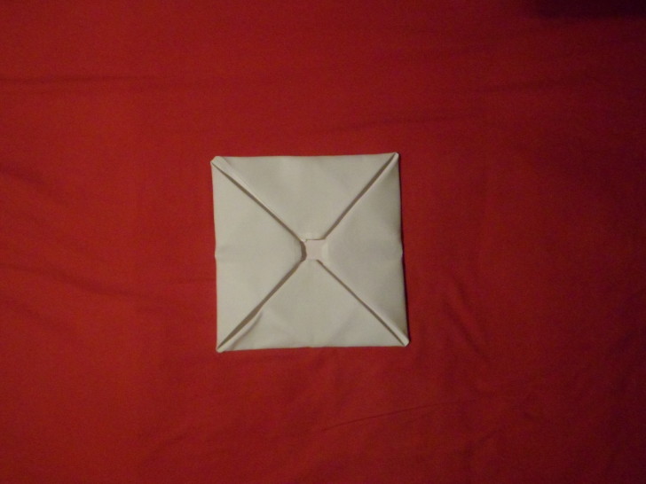 Napkin Folding Rose Fold Step Nine fold the last corner down from the top as if you were shutting an envelope 